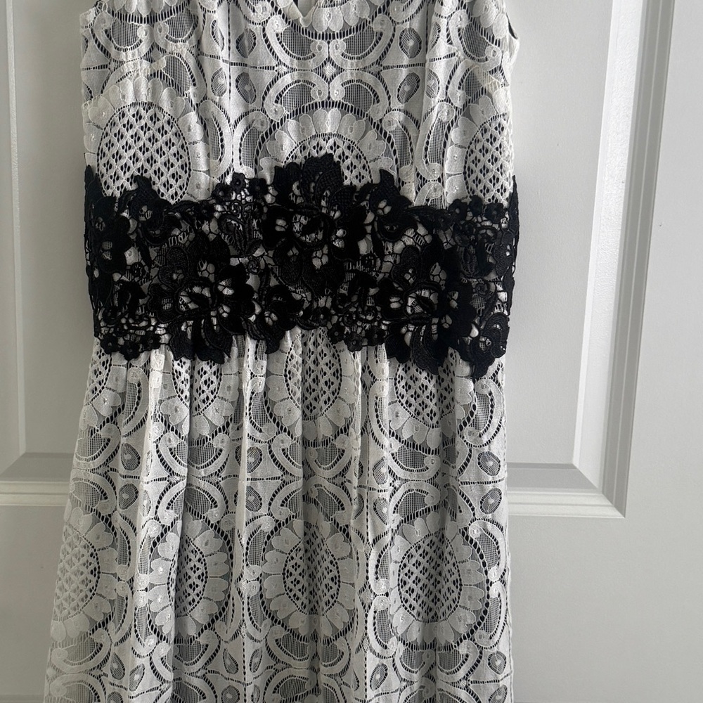 Elegant Black and White Lace Kids Dress
Size 0
Condition-Like New